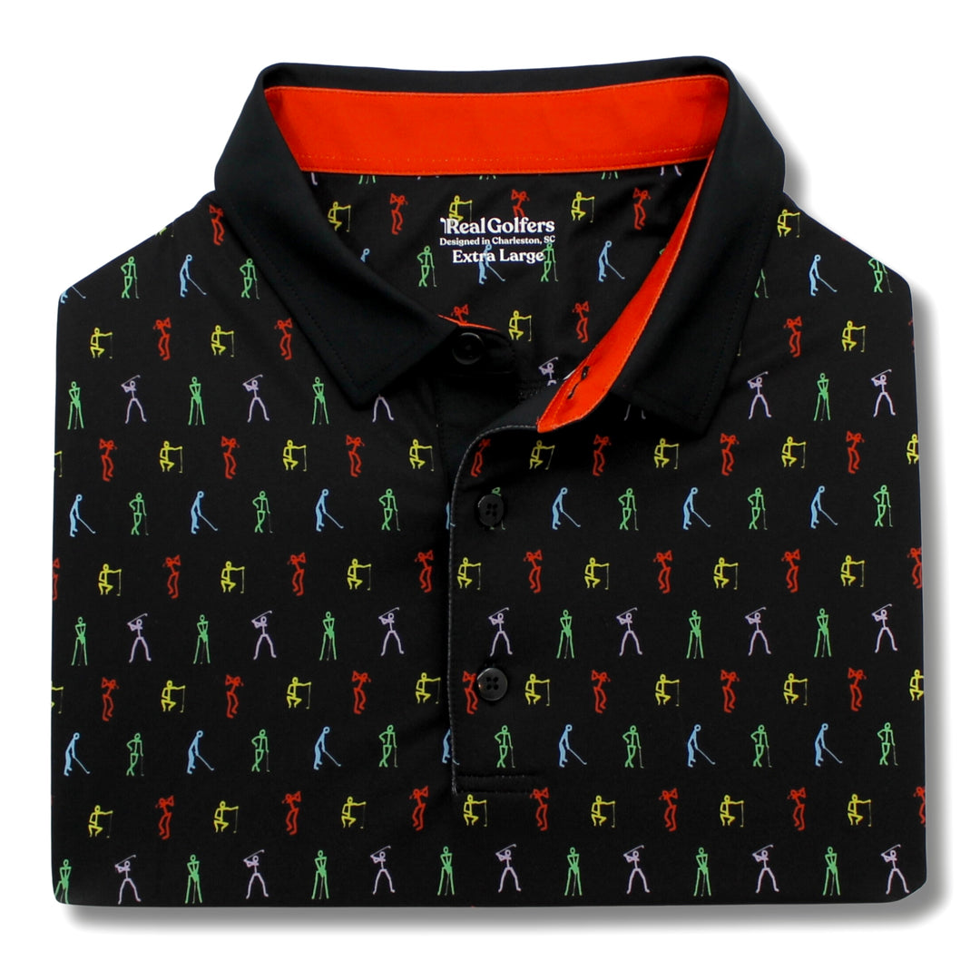 A close up of a black performance golf polo with red trim around the collar, and a pattern of colorful stick figure golfers.