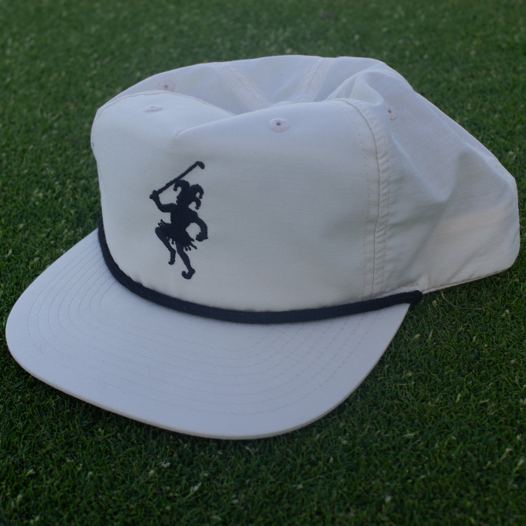 White golf hat with a black rope and dancing Jester Logo embroidered on the front.