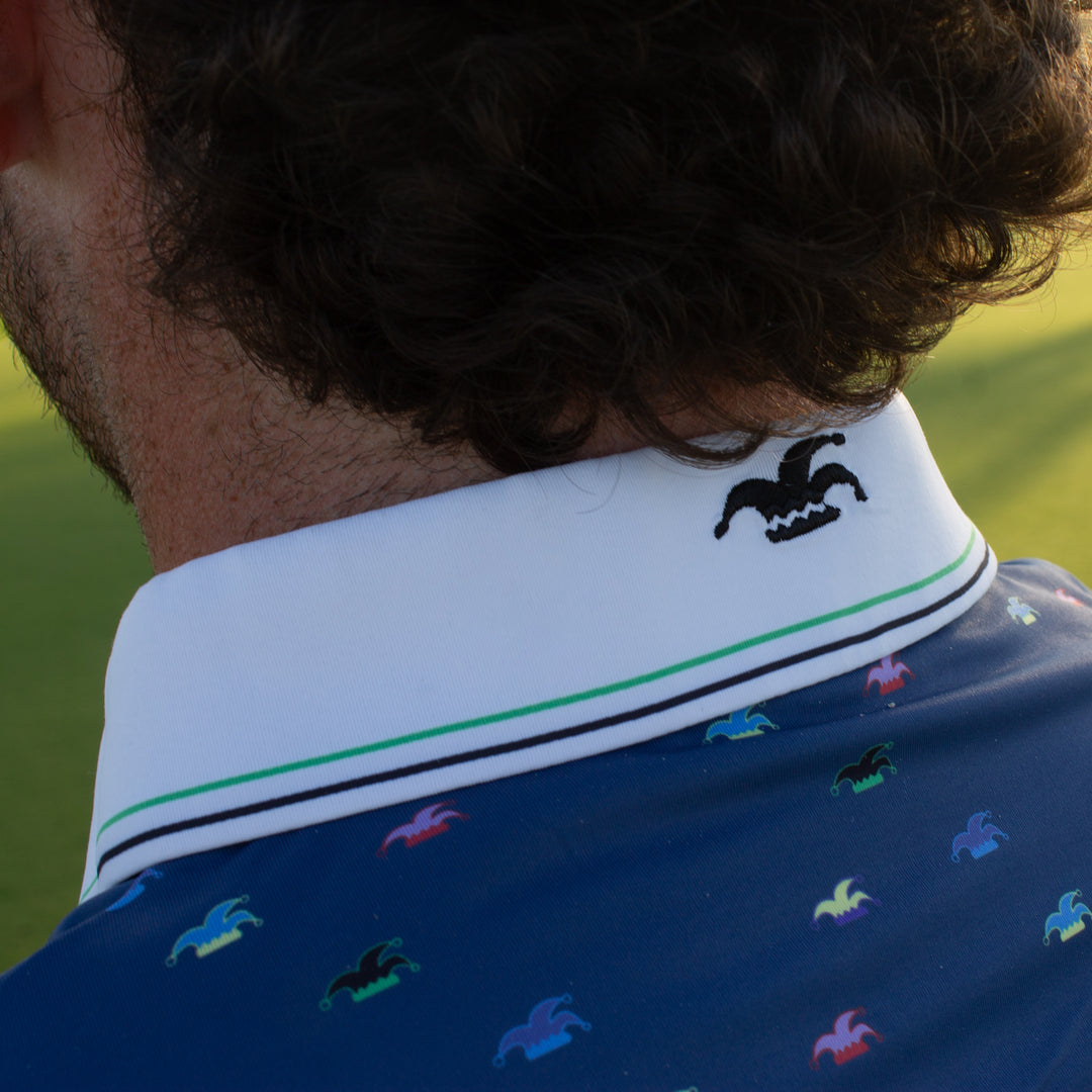 A close up of the back of a collar showing the embroidered logo on the collar.