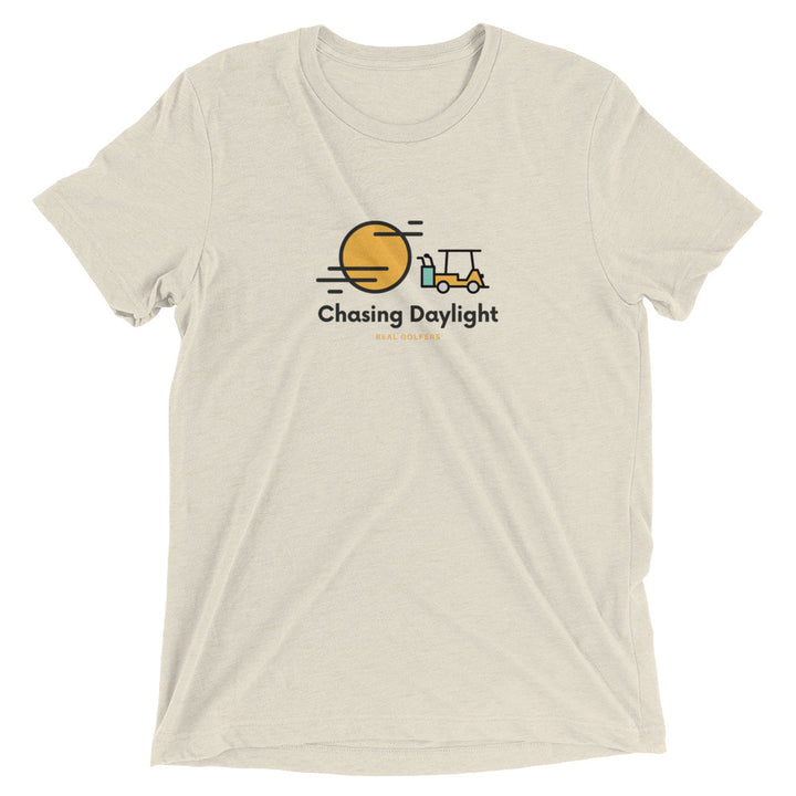 Oatmeal colored tri-blend fabric material t-shirt featuring a graphic of a golf cart and a sun.